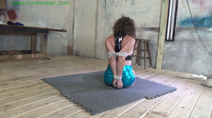 www.xsiteability.com - Carried into the lair & cruelly hogtied in her shiny new boots  thumbnail